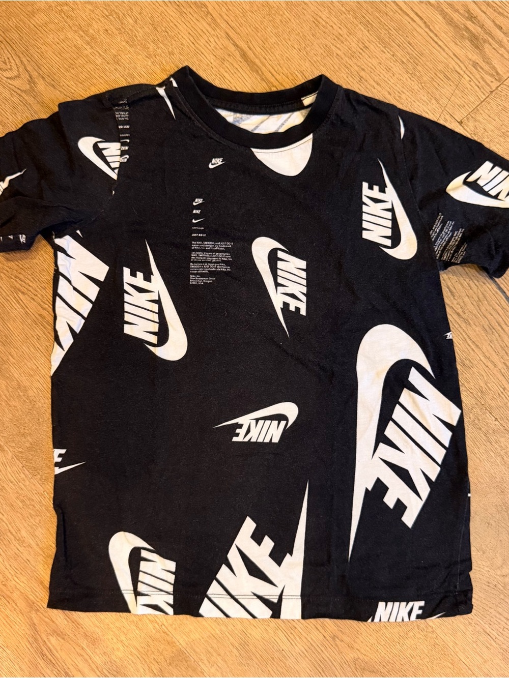 Nike boys Black graphic Tee with White Swoosh Logo Print